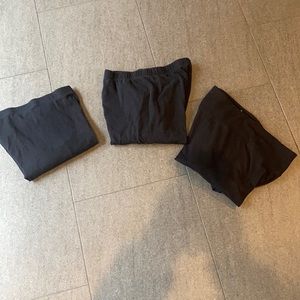 Three pairs of standard black leggings
